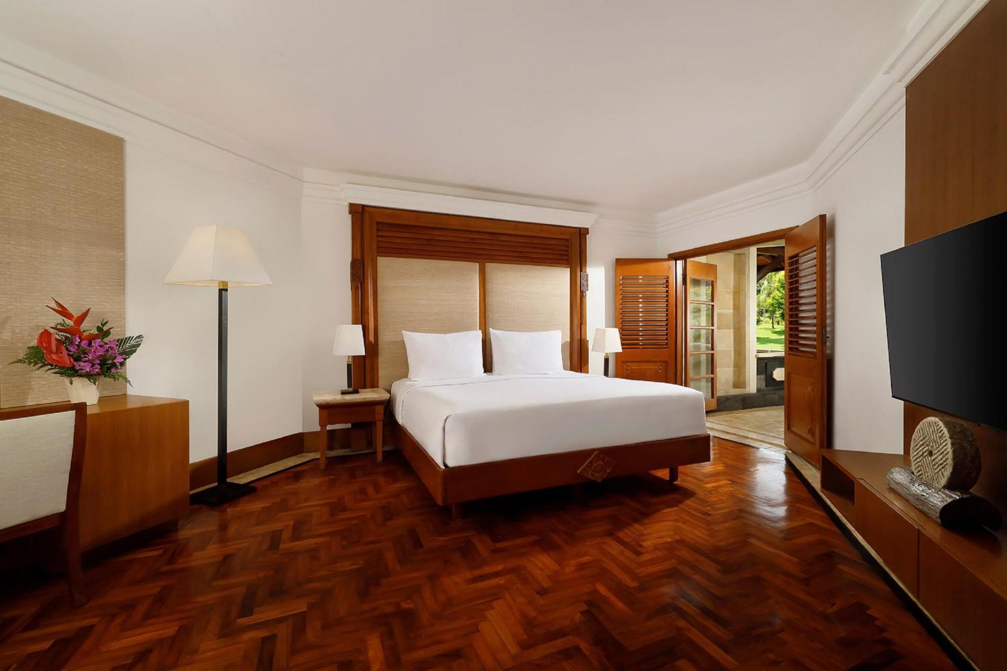 Nusa Dua Beach Hotel And Spa - Handwritten Collection Esterno foto A bedroom at the hotel