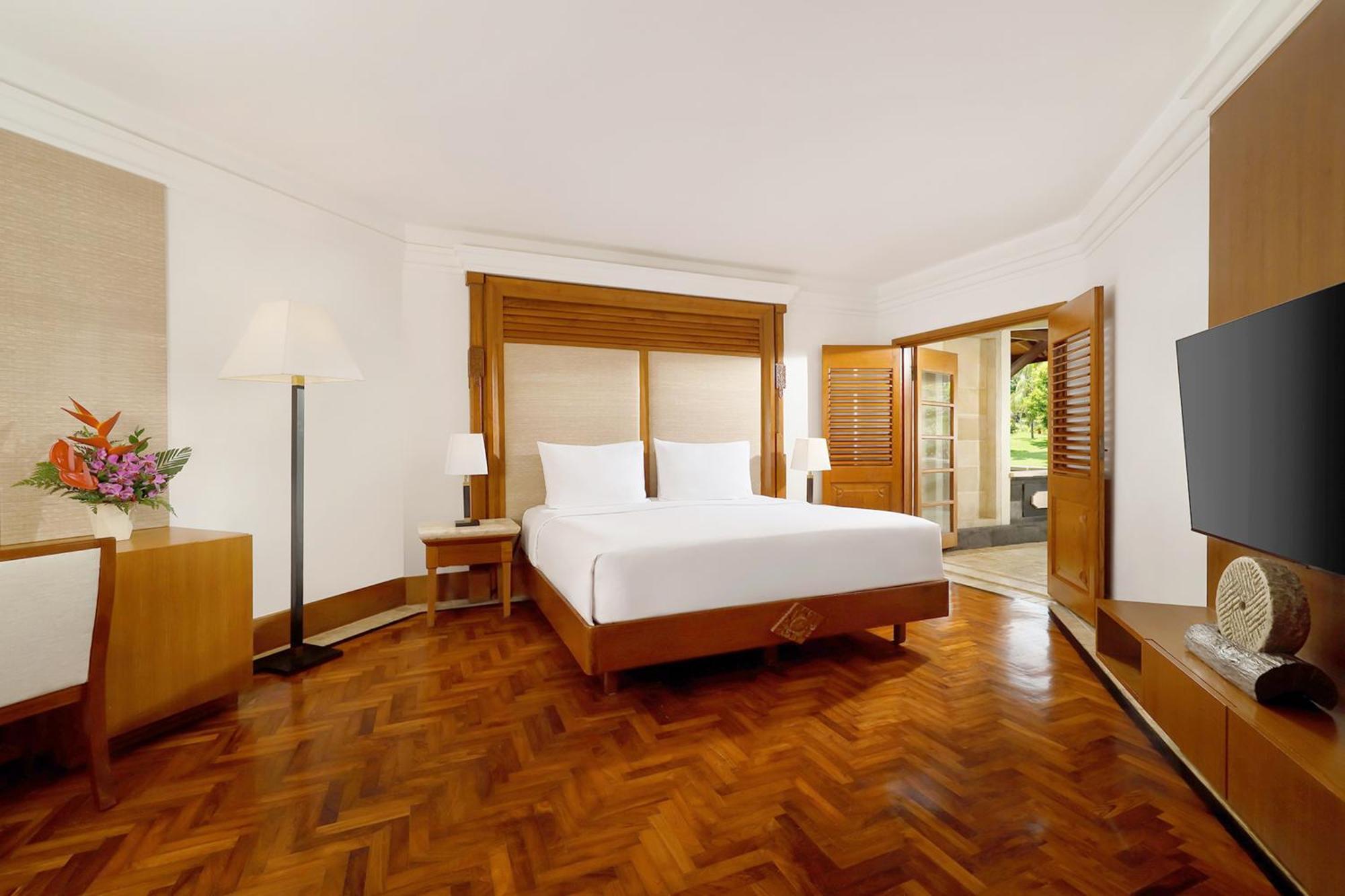 Nusa Dua Beach Hotel And Spa - Handwritten Collection Esterno foto A bedroom at the hotel