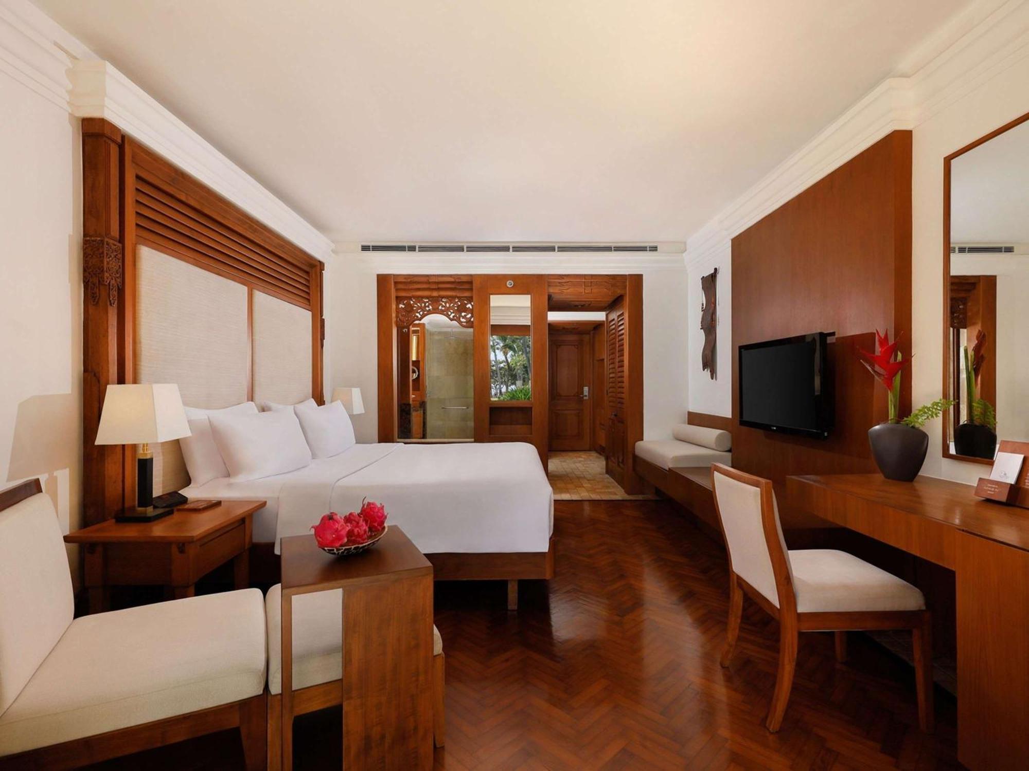 Nusa Dua Beach Hotel And Spa - Handwritten Collection Esterno foto Deluxe Room
